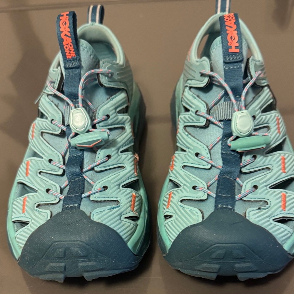 Hoka Aqua and Dark Blue Running Shoes